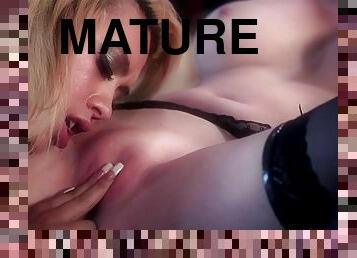 Short haired mature blonde lesbian Honour May pussy licked in a bra