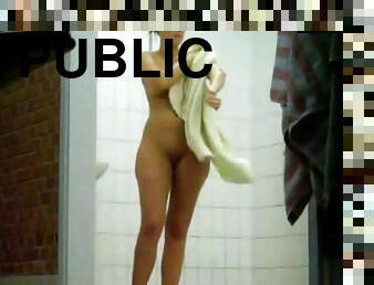 Next door females unaware of the camera in a public shower room.
