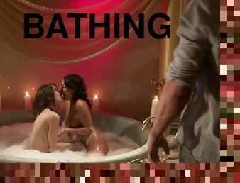 One lucky guy joins Sandra Romain and Sasha Grey during their bath