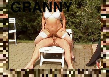 Fat granny spreads her legs for a handsome hunk's penis