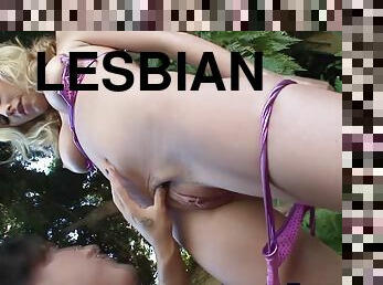 two sexy lesbians have anal sex with a strapless dildo then suck off the juices