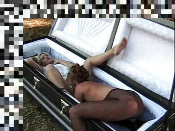 Lesbian hotness Chasey Lain enjoys having her pussy sucked in a coffin