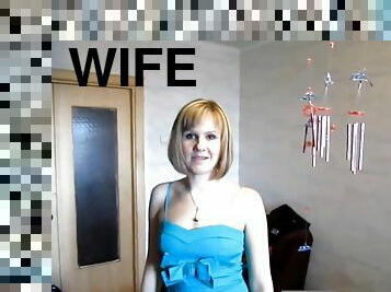Blonde wife in dress gives a blowjob