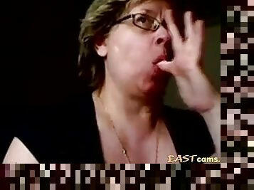 Granny eats cum on webcam