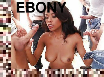 Nia Nacci is a stunning ebony brunette choking on white boners