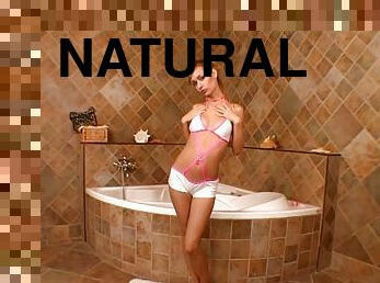Amazing girl makes herself cum in luxurious bathroom