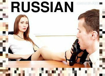 Foot fetish Russian bimbo in miniskirt stepping on her guy