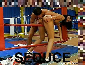 Sporty brunette seduces then fucks her trainer in the ring hardcore