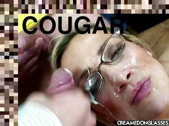 Salacious cougar with glasses enjoying a hardcore gangbang