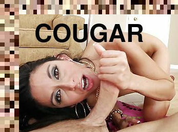 After a hand job this brunette cougar is awarded with a facial