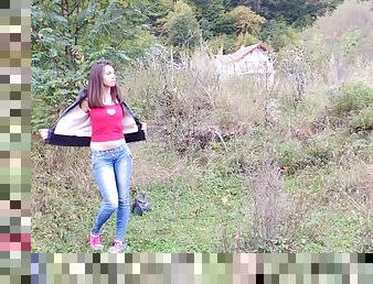 Long haired teen fingering her bald snatch outdoors