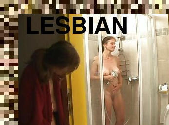 Desirous lesbian milf getting her pussy fingered in shower