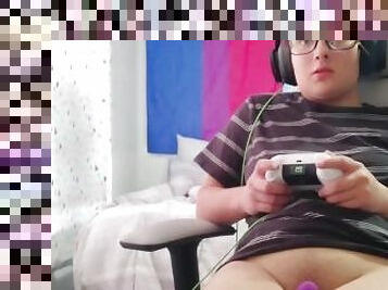 Transman uses toy while playing video games, tries not to cum
