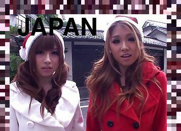 Two depraved Japanese Santa girls ride a shaft by turns in FFM reality