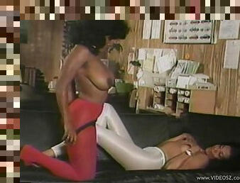 Ebony lesbian babes have sex in vintage video