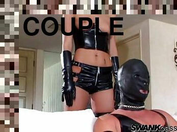 A guy in a leather mask fucks his mistress in both holes