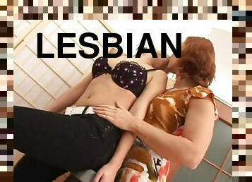 Jasmina and Candy Sweet lick pussies in a lesbian sex video