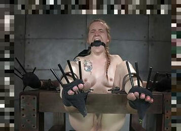 Inked blonde slave gets punished by her master in the dungeon