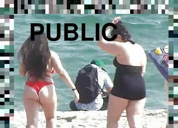 Chubby babes have fun on the public beach