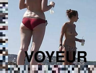 Slender topless girls on vacation get spied on