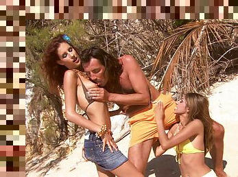 Sahara and Leanna treat a fellow to a threesome on a beach