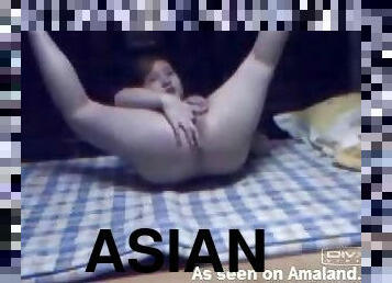 Asian Hottie Masturbates With A Dido