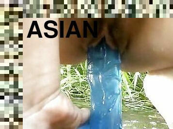 Asian Hottie Penetrates Her Wet pussy With A Dildo