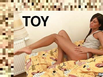 Buzzing toy makes long haired solo model moan with pleasure