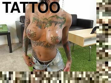 On her live cam show Bonnie Rotton shows off her tats and cums hard