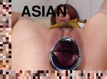 Look into her lovely Asian pussy thanks to a speculum
