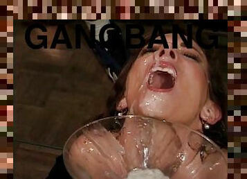 During a gangbang her mouth is turned into a cum dumpster