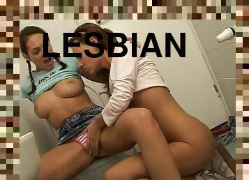 Teen lesbian gets eaten out by Gf while sitting on the toilet