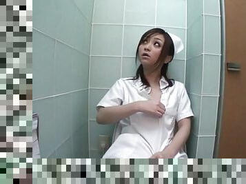 Nurse sneaks into the bathroom to masturbate with a vibrator