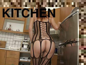 Lingerie clad cutie gets fucked silly in the kitchen