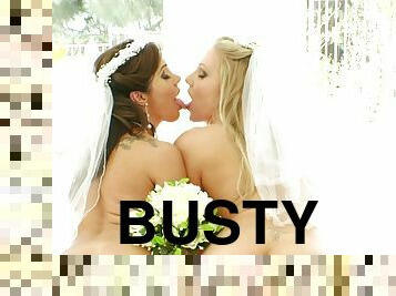 Staggering scene with two busty lesbian brides