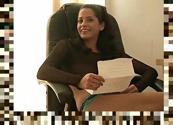 Brunette charmer in sexy panties gives an interview at the office