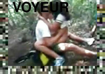 Voyeur Tapes A Teen Riding Her BF In The Forest