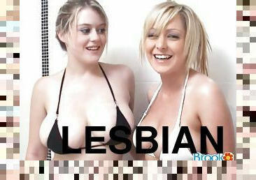 Two well-endowed blondes take a shower together in hardcore scene