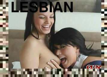 Two pretty brunettes play with dildos in hardcore lesbian scene