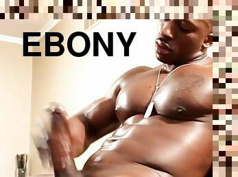 Beefy swat ebony solo flexs tug and cum