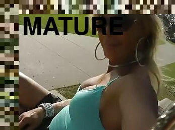 Mature transvestite anal plug outdoors