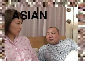 Short haired Asian wife fingers herself while her hubby sleeps