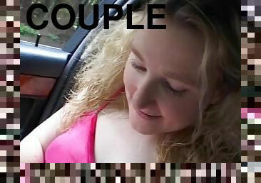 Panty flashing girl in the car gives her man head at home