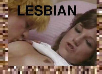 Lesbians enjoying a retro masturbation