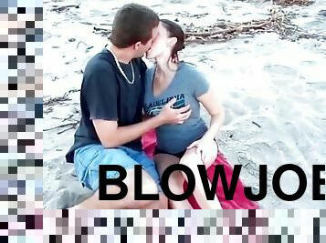 Kissing a cutie that sucks his dick on the beach