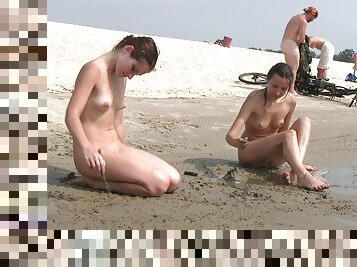 Young nudist friends naked together at the beach 3