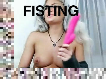 Blonde babe fingering and fisting her pussy live on webcam