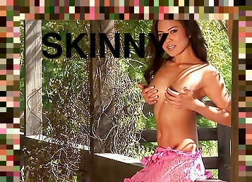 Skinny Asian lingerie striptease outdoors