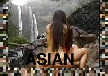 Slender Thai babe fucked out by the waterfall