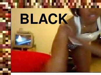Black girl in glasses does webcam show